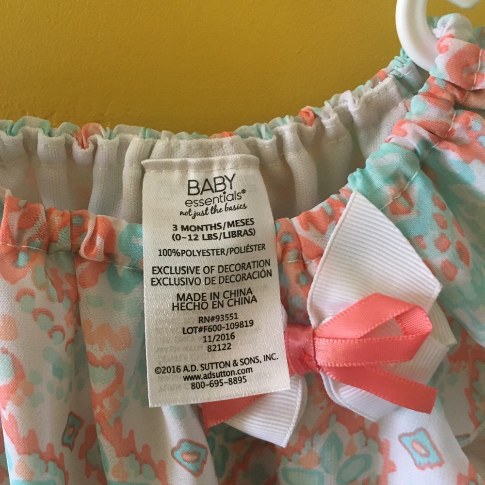 Gorgeous dress . Baby Essential brand. Like new. 3 months